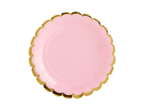 Pale pink paper party plate with gold scalloped edge detail.