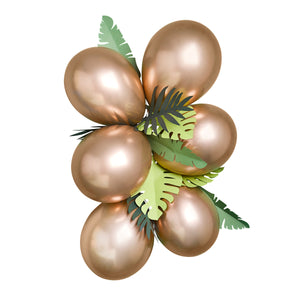 Six bronze balloons grouped with green leaf decorations for a jungle themed birthday party. 