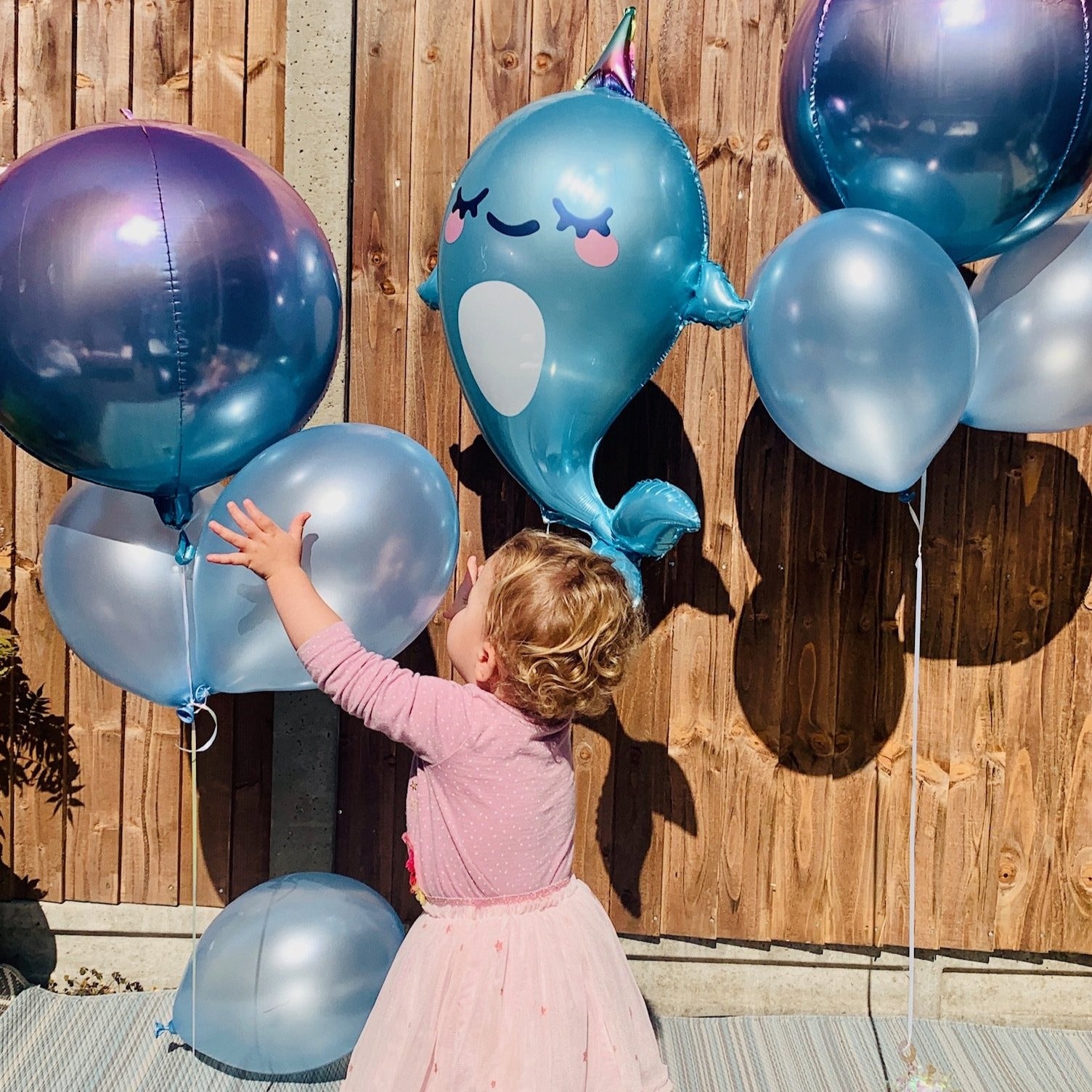 light blue Narwhal foil helium balloon