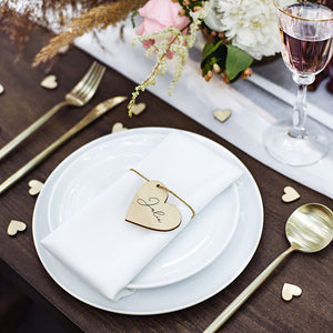 Natural wooden heart shaped wedding place tags with linen brown string