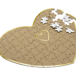 heart shaped puzzle guest book for your wedding day in brown kraft paper with gold trim detail for your guest to write on