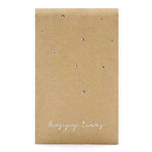 pack of 3 tissues for your wedding guests with the words happy tears in silver foil writing on kraft brown paper pack
