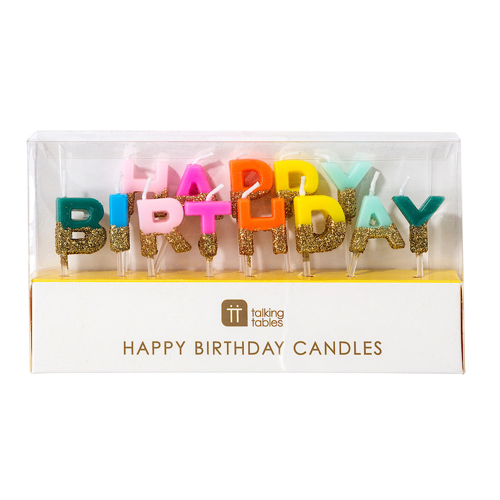 13 Individual rainbow colour candles dipped in gold glitter  with the letters Happy Birthday