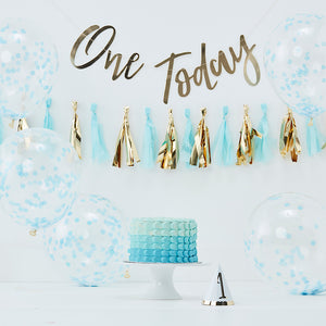 first birthday Cake smash decoration kit includes one today gold banner, blue and gold tassle garland, blue confetti balloons and a gold foil number 1 hat