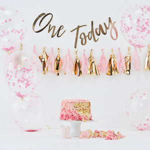 pink first birthday cake smash decorations kit. Includes one today gold banner, pink and gold tassle garland, pink confetti balloons and 1 gold foil princess crown hat