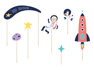 Space party themed cake topper with planets, rocket, star and astronaut.