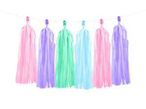 Hanging pastel tissue paper tassels, in purple, green, pink and blue