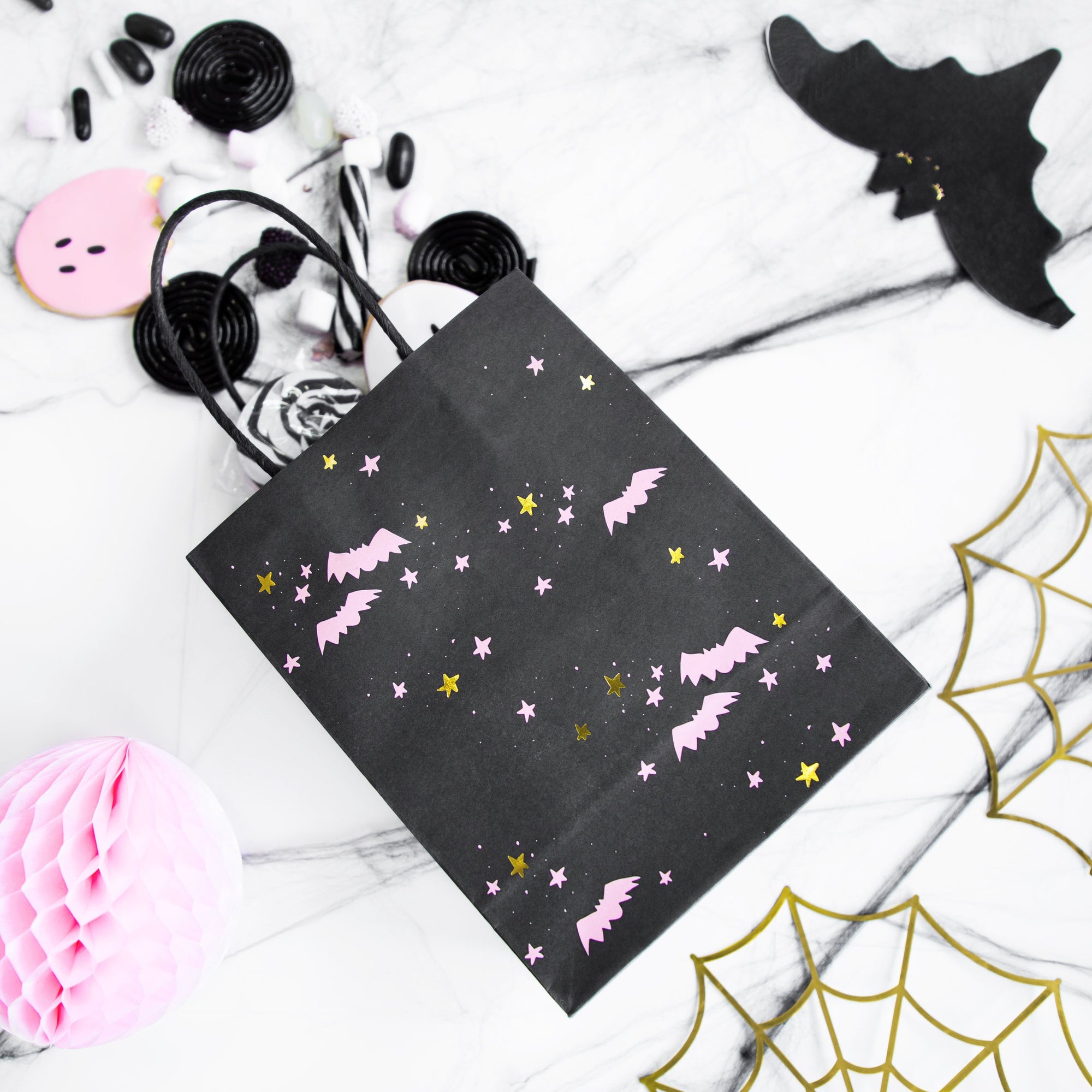 Black halloween party bags with pink bats and gold and pink stars