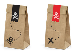 Pirate party bags in brown paper with red and black stickers with skull and bone illustrations in white. Pirate themed birthday party for girls and boys party or birthday parties from la di dah